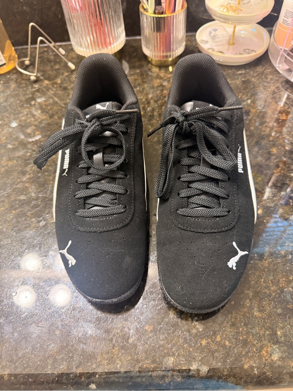 Puma women’s Black & White Low-Profile Suede Sneakers